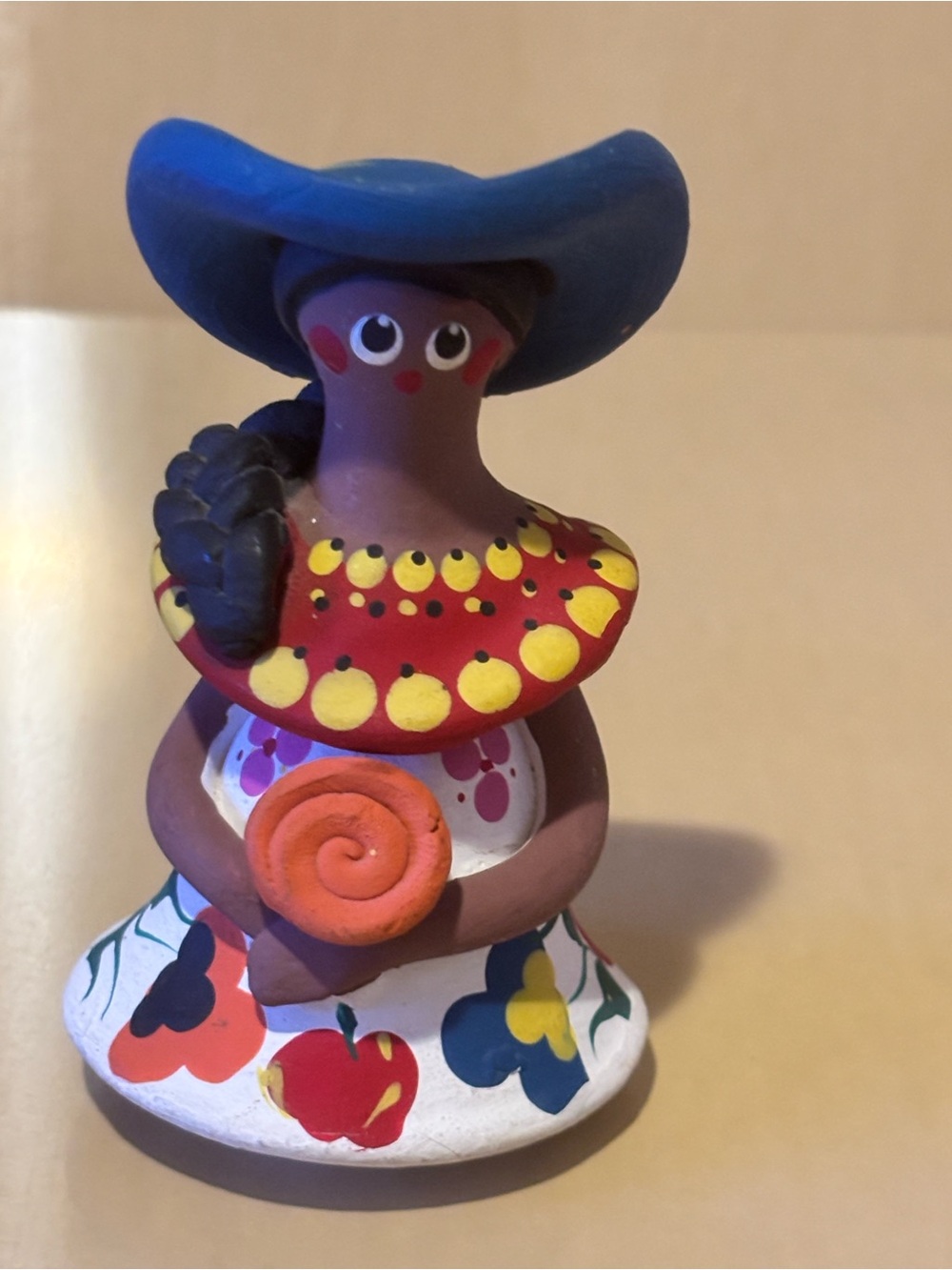 Handcrafted Clay Woman with Blue Hat Figurine